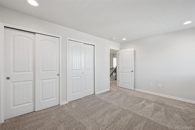 1871 Walnut Creek Ct, Colorado Springs, CO 80921 - unfurnished bedroom with multiple closets, carpet, and recessed lighting