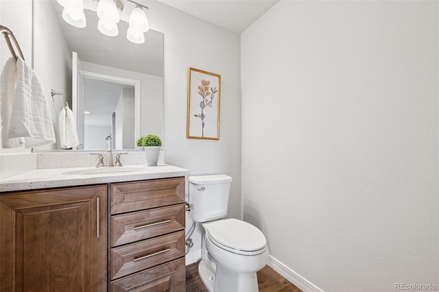 1871 Walnut Creek Ct, Colorado Springs, CO 80921 - bathroom featuring vanity and wood finished floors