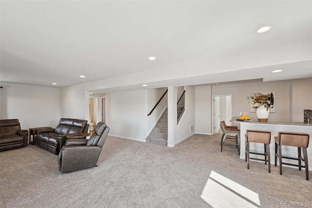 1871 Walnut Creek Ct, Colorado Springs, CO 80921 - living area featuring light carpet, recessed lighting, and stairs
