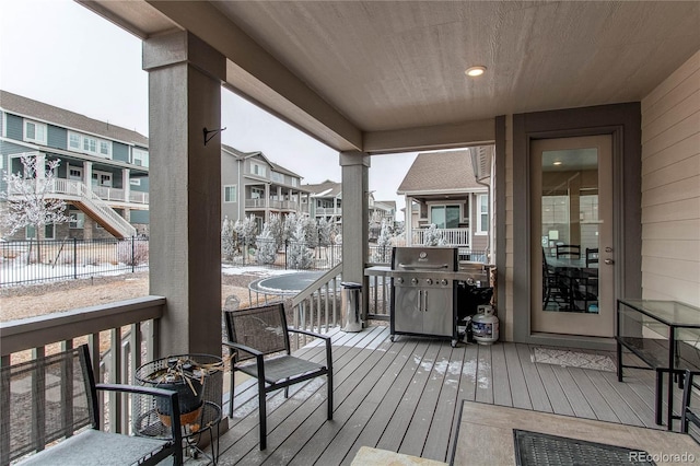 wooden deck featuring grilling area