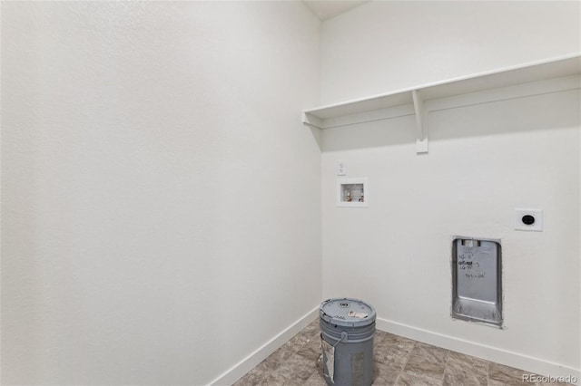 washroom with hookup for a washing machine, baseboards, and hookup for an electric dryer