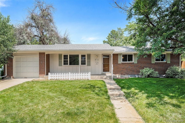 8675 W 60th Ave, Arvada, CO 80004 - single story home with an attached garage, a porch, a front yard, driveway, and board and batten siding