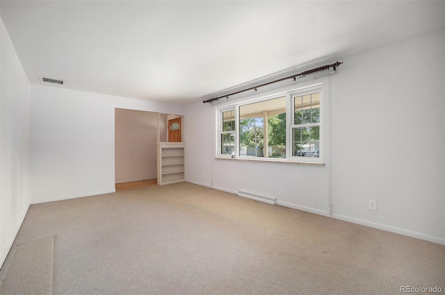 8675 W 60th Ave, Arvada, CO 80004 - spare room featuring carpet and baseboards