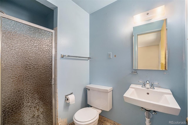 8675 W 60th Ave, Arvada, CO 80004 - bathroom featuring a shower stall and toilet