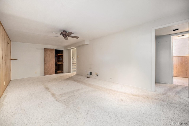 8675 W 60th Ave, Arvada, CO 80004 - carpeted spare room with a ceiling fan and stairway