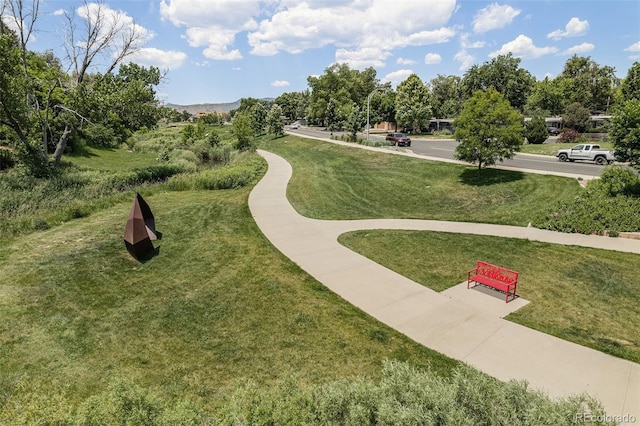 8675 W 60th Ave, Arvada, CO 80004 - view of community featuring a lawn