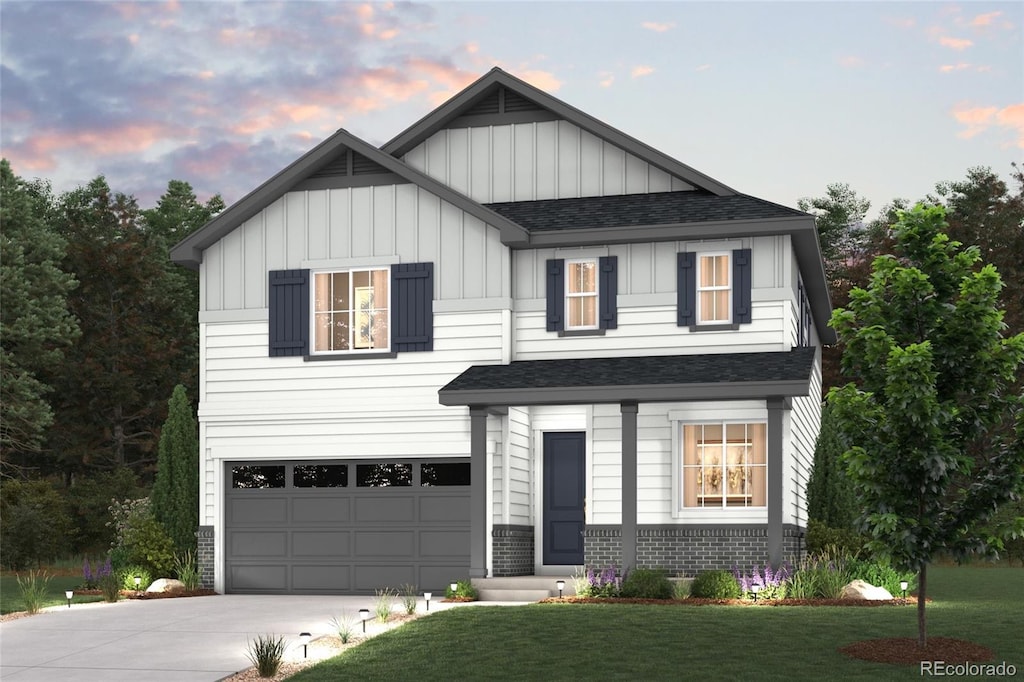 4720 N Valdai Ct, Aurora, CO 80119 - view of front of home with board and batten siding, driveway, a shingled roof, and a garage