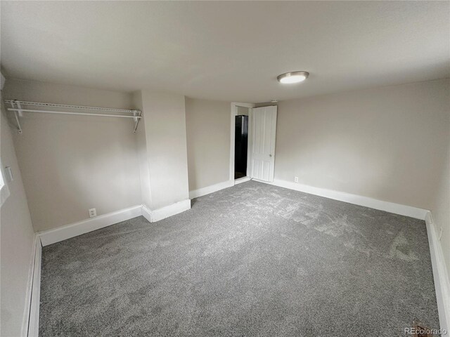 672 4th St, Limon, CO 80828 - unfurnished bedroom featuring baseboards, carpet, and a closet