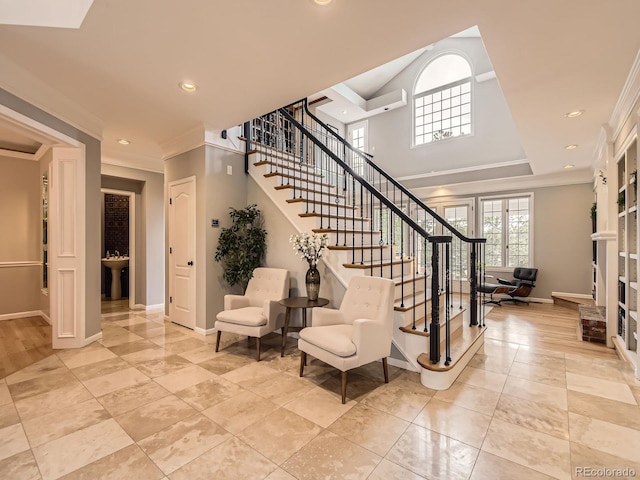 18963 E Long Ave, Centennial, CO 80016 - staircase with ornamental molding, baseboards, and recessed lighting