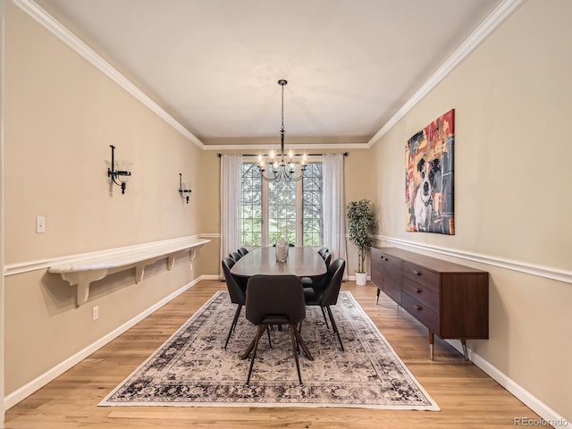 18963 E Long Ave, Centennial, CO 80016 - dining area featuring a chandelier, crown molding, light wood-type flooring, and baseboards