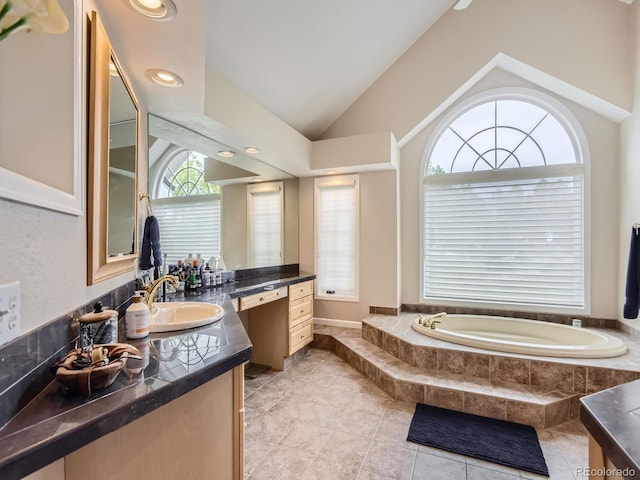 18963 E Long Ave, Centennial, CO 80016 - full bath with vaulted ceiling, a bath, vanity, and tile patterned floors
