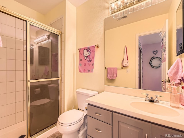 18963 E Long Ave, Centennial, CO 80016 - bathroom with toilet, a stall shower, and vanity
