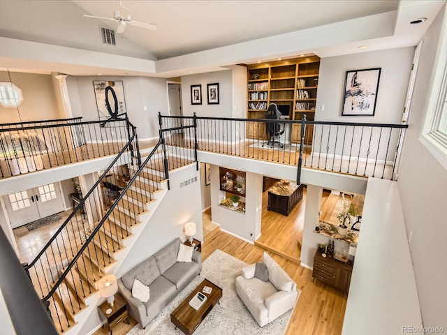18963 E Long Ave, Centennial, CO 80016 - living room featuring wood finished floors, vaulted ceiling, and ceiling fan