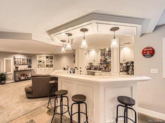 18963 E Long Ave, Centennial, CO 80016 - indoor wet bar featuring pendant lighting, carpet, and baseboards