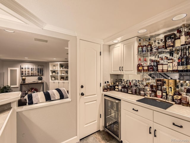 18963 E Long Ave, Centennial, CO 80016 - indoor wet bar featuring beverage cooler, recessed lighting, and ornamental molding