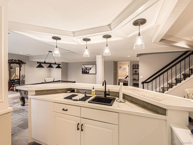 18963 E Long Ave, Centennial, CO 80016 - kitchen with a sink, coffered ceiling, white cabinetry, pendant lighting, and light countertops
