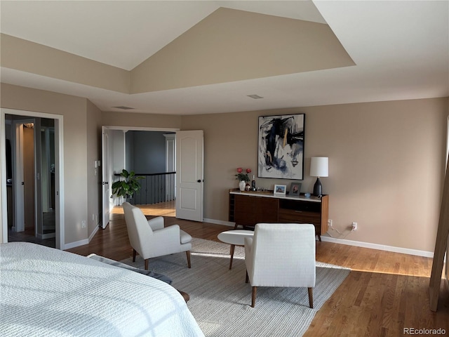 18963 E Long Ave, Centennial, CO 80016 - bedroom featuring wood finished floors and vaulted ceiling
