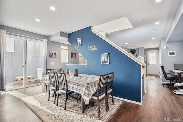 dining space featuring hardwood / wood-style flooring