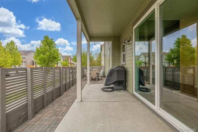 1754 W 66th Ave, Denver, CO 80221 - view of patio featuring a residential view and a grill