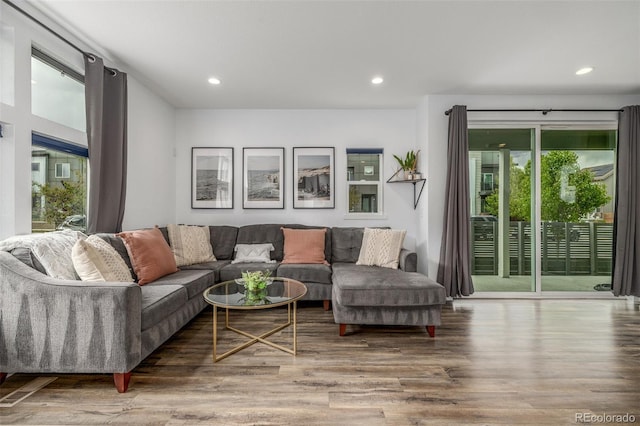 1754 W 66th Ave, Denver, CO 80221 - living room with plenty of natural light, wood finished floors, and recessed lighting