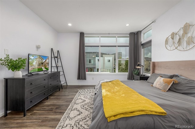 1754 W 66th Ave, Denver, CO 80221 - bedroom with dark wood finished floors, recessed lighting, and baseboards