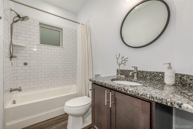 1754 W 66th Ave, Denver, CO 80221 - full bathroom featuring vanity, shower / bathtub combination with curtain, toilet, and wood finished floors