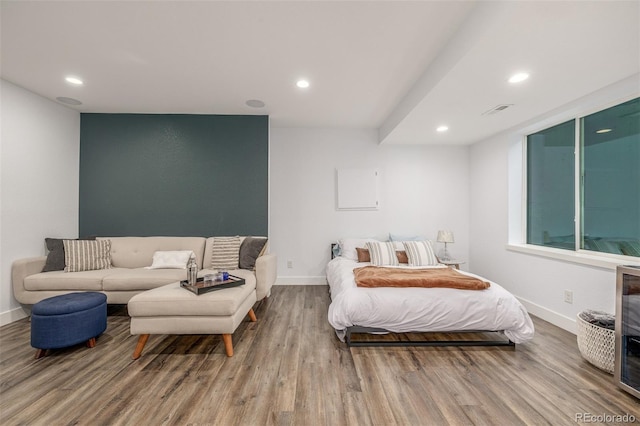 1754 W 66th Ave, Denver, CO 80221 - bedroom with wood finished floors, baseboards, and recessed lighting