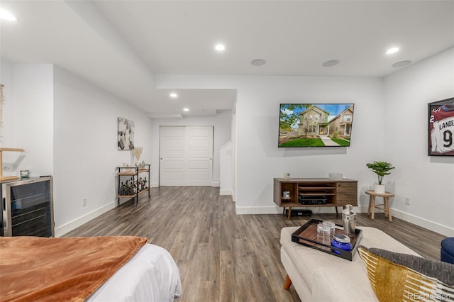 1754 W 66th Ave, Denver, CO 80221 - bedroom featuring wood finished floors, recessed lighting, baseboards, beverage cooler, and bar area