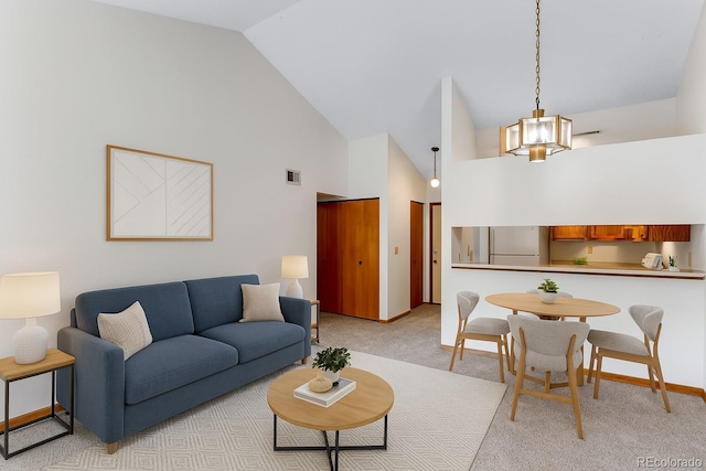 2960 W Stuart St Unit 302, Fort Collins, CO 80526 - living area featuring high vaulted ceiling and light carpet