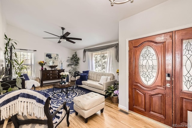 1973 S Pitkin St, Aurora, CO 80013 - entryway featuring vaulted ceiling, light wood finished floors, plenty of natural light, and a ceiling fan