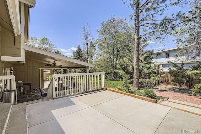 1973 S Pitkin St, Aurora, CO 80013 - view of patio with a ceiling fan and fence
