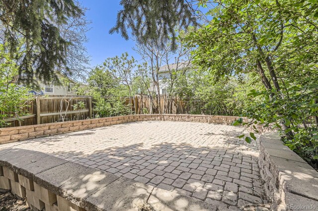 1973 S Pitkin St, Aurora, CO 80013 - view of patio / terrace featuring a fenced backyard