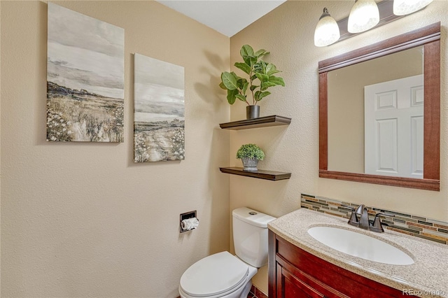 half bath with toilet and vanity