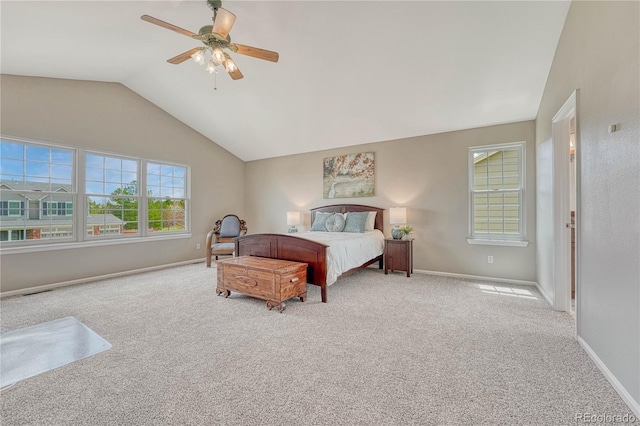 bedroom with baseboards, carpet, ceiling fan, and lofted ceiling