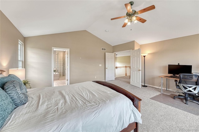 carpeted bedroom featuring visible vents, baseboards, a ceiling fan, ensuite bath, and vaulted ceiling