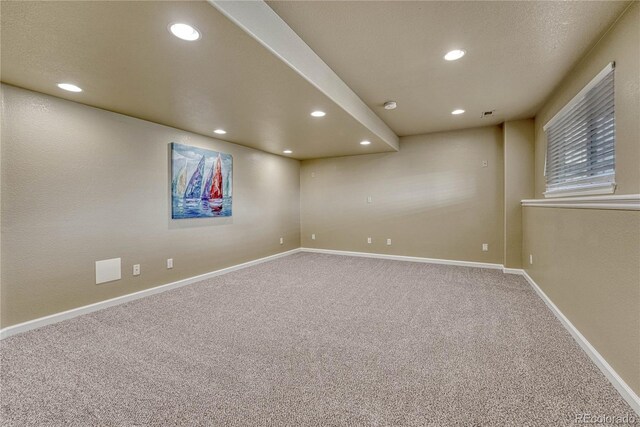 basement with recessed lighting, carpet, and baseboards