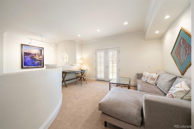 living area featuring french doors, crown molding, recessed lighting, light carpet, and baseboards