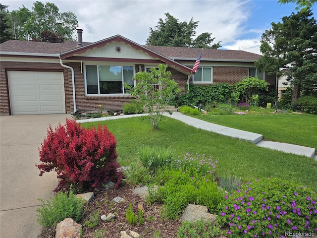 5047 S Mabre Ct, Littleton, CO 80123 - ranch-style home featuring brick siding, a garage, a front yard, and driveway