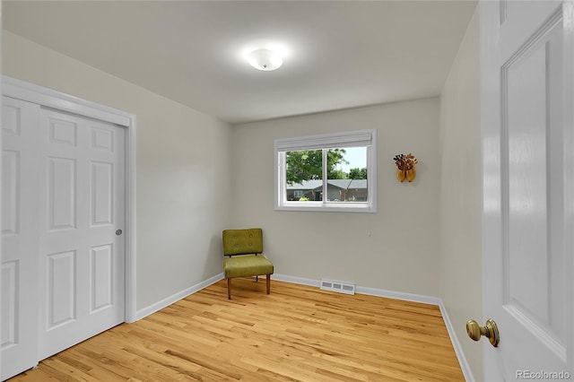 5047 S Mabre Ct, Littleton, CO 80123 - living area featuring light wood-style flooring and baseboards