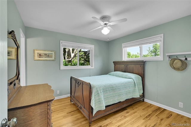 5047 S Mabre Ct, Littleton, CO 80123 - bedroom featuring light wood-style floors and ceiling fan