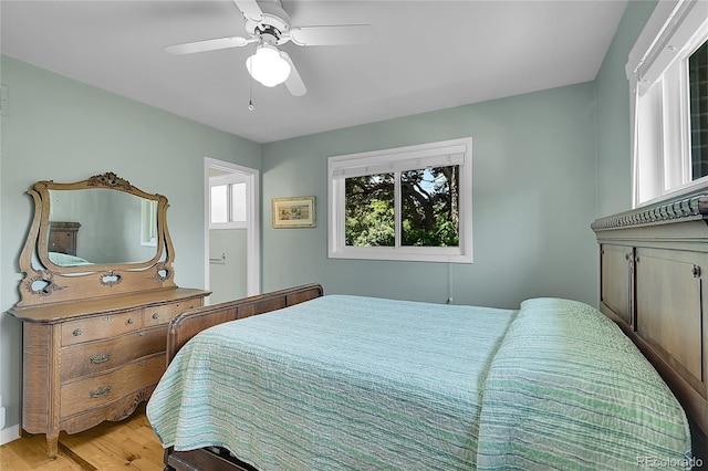 5047 S Mabre Ct, Littleton, CO 80123 - bedroom featuring light wood-style floors and a ceiling fan