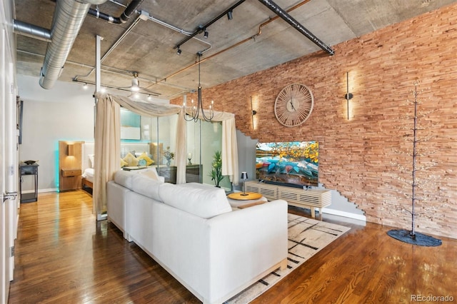 1720 Wazee St Unit 2B, Denver, CO 80202 - living room with brick wall and wood finished floors