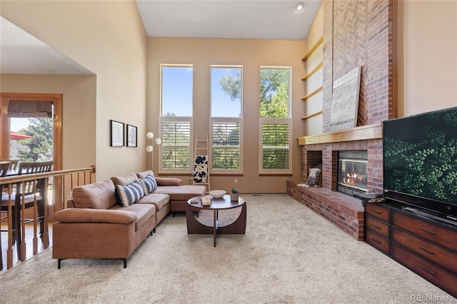9447 Chesapeake St, Highlands Ranch, CO 80126 - carpeted living area featuring a fireplace