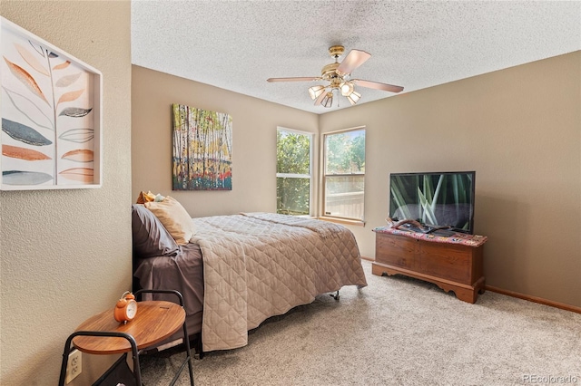 9447 Chesapeake St, Highlands Ranch, CO 80126 - bedroom featuring carpet flooring, a textured ceiling, ceiling fan, and a textured wall