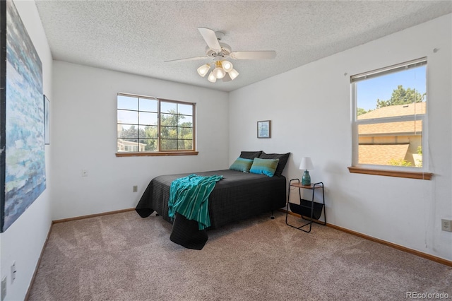 9447 Chesapeake St, Highlands Ranch, CO 80126 - carpeted bedroom featuring a textured ceiling and a ceiling fan