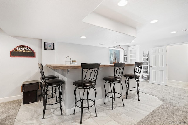 9447 Chesapeake St, Highlands Ranch, CO 80126 - indoor wet bar featuring light carpet and recessed lighting