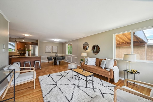 1646 S Stuart St, Denver, CO 80219 - living room with light wood-type flooring