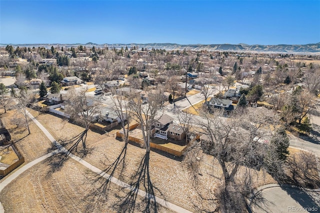 birds eye view of property with a residential view and a mountain view