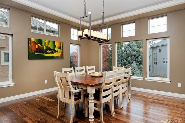 14022 E Fair Pl, Centennial, CO 80111 - dining space with ornamental molding, a chandelier, wood finished floors, baseboards, and recessed lighting
