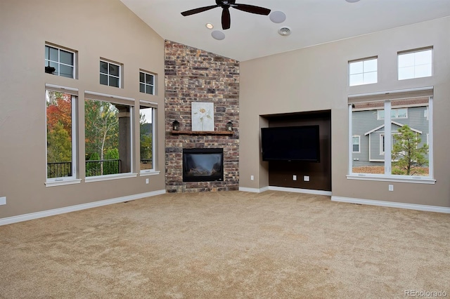 14022 E Fair Pl, Centennial, CO 80111 - unfurnished living room with carpet floors, a ceiling fan, plenty of natural light, and high vaulted ceiling